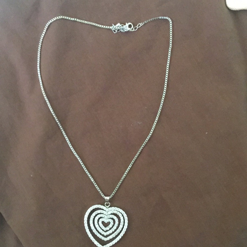 Set of necklace and heart earrings
